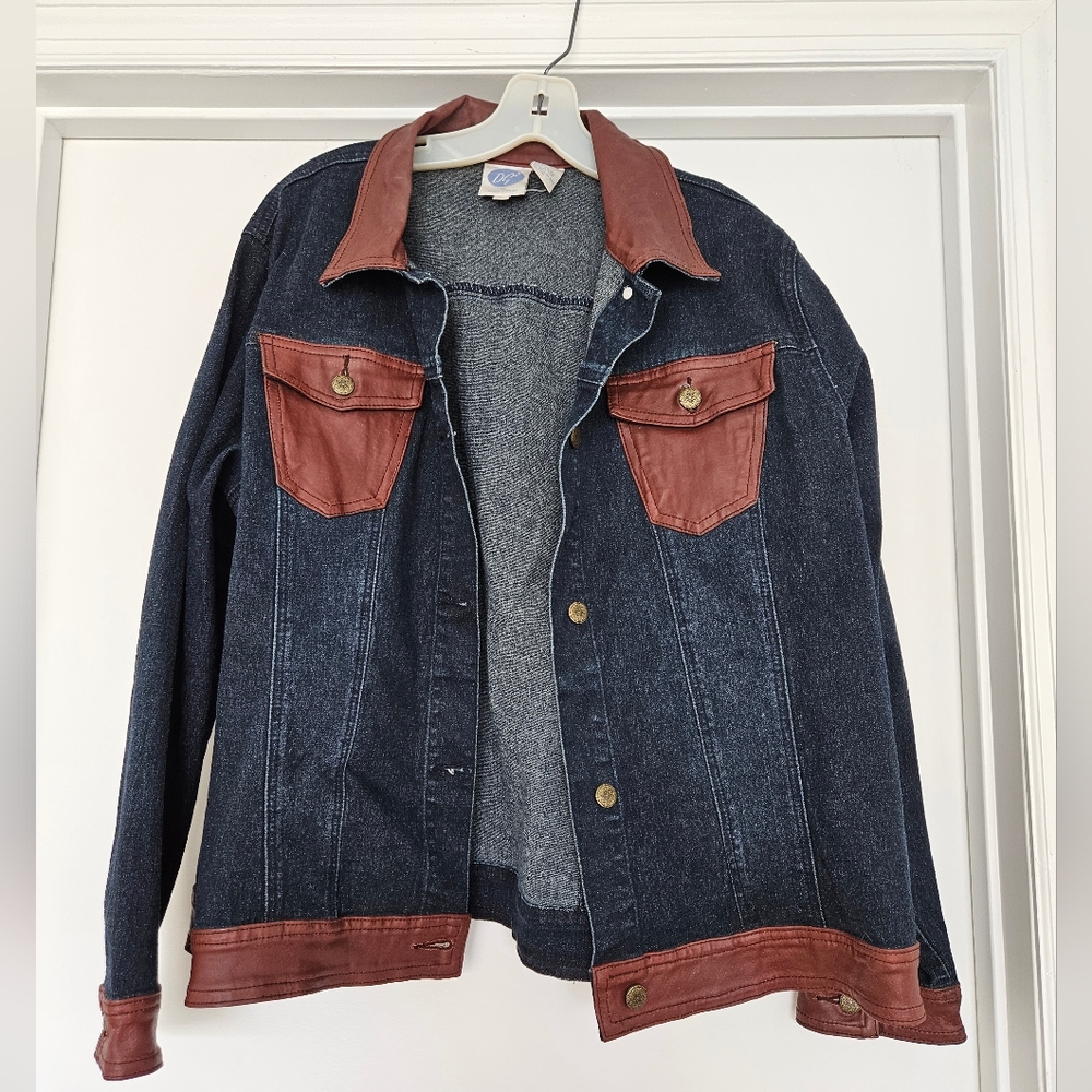 Vintage Diane Gilman dark jean jacket with leather collar and cuffs.